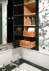 Schumacher Birds And Butterflies Wallpaper In Bathroom Contemporary Bathroom Features Upper Walls Clad In Schumacher Birds And Bu Black Medicine Cabinet Traditional Bathroom Contemporary Medicine Cabinets
