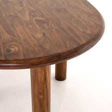 Kidney shaped activity table with thick top and adjustable preschool legs is equipped with locking casters, so it can easily roll from place to place. Andi Dining Table Amber Pine France Son