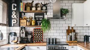 A metal container can serve as a vase in a pinch, but just be sure to place your flowers inside a glass before tucking them inside the metal. Before And After A Budget Kitchen Makeover With Wow Factor Real Homes