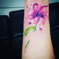 Flower tattoos are a popular pick for their symbolism. Instagram Photo By Jenny Bocharov May 13 2016 At 1 33pm Utc Lily Tattoo Stargazer Lily Tattoo Watercolor Tattoo Flower