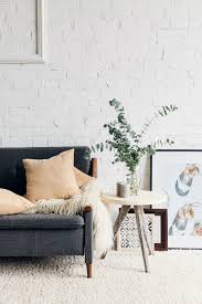 A Contemporary Living Room With A Beautiful White Brick Wall Mortonstones Brick Tiles Rustic Home White Brick Wallpaper Removable Brick Wallpaper Decor