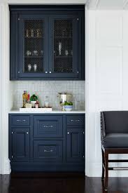 Pick a piece of cabinetry and use a dark shade to turn it into a feature. Dark Blue Cabinets Houzz