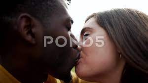 Interracial tongue kissing