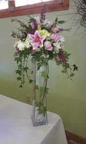 Ivy Lilies Freesia Baronia Heather Table Centerpiece Table Centerpieces Centerpieces Flowers