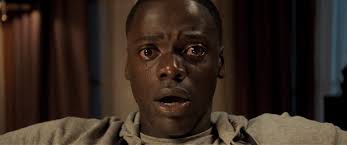 Get Out movie review & film summary (2017)