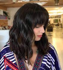 30 most attractive short curly hairstyles for women. 25 Latest Medium Length Hairstyles With Bangs For 2021