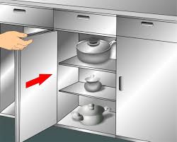 One of the best ways to clean greasy kitchen cabinets made of wood is with baking soda and vegetable oil. 3 Ways To Clean Kitchen Cabinets Wikihow
