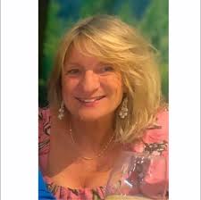 My daughters dad has washed all her new white school t-shirts with her  green cardigan and now they are an awful shade of green. Any ideas of how  to get them back