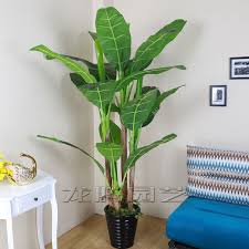 This plant stays forever green and is design: Fake Tree Tropical Tree Plant Simulation Banana Leaves Hotel Outdoor Large Green Plants Floor Flowers Bonsai Greening