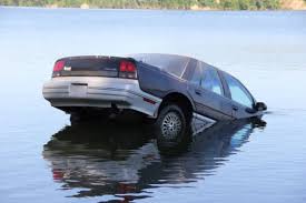 car sinking in lake. album on imgur
