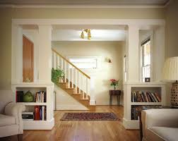 Looking for inspiring traditional living room ideas? Traditional Living Room By Emerick Architects Want To Build Divider Like This In Dining Room To Cordon Off Walls Room Half Wall Room Divider Interior Columns