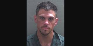 Report: Man broke into Escambia County home, battered woman