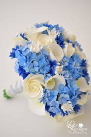 Especially pretty with succulents and cacti, this is ideal for boho chic and desert weddings because it fits in quite naturally with the landscape. Too Much Blue Not Enough Champagne Blue Wedding Bouquet Blue Wedding Centerpieces Hydrangea Centerpiece Wedding