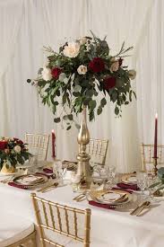 If you're looking for maroon flowers or burgundy roses for a wedding, each burgundy flower arrangement is a unique option. 19 Best Burgundy Floral Centerpieces Ideas Floral Centerpieces Wedding Decorations Wedding Flowers