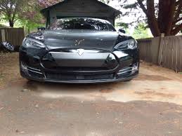 The metal is heated and forced into shape using extreme pressure, and then finish machined to its final form. Thoughts On Solid Black Vs Obsidian Black Metallic Help Tesla Motors Club
