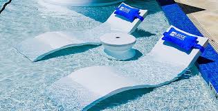 Your pool should have features that will cater to your family's every need, whether that need is to swim, float on a giant inflatable pizza, take a nap, or keep a close eye on the kids. Signature Chaise Tanning Ledge Pool Pool Lounger Ledge Lounger