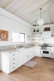 A lot of kitchens include islands that double as bars or breakfast tables. Remodeling 101 What To Know When Replacing Your Range Remodelista