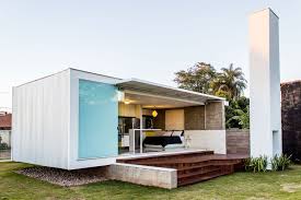 If you are looking for an efficient and creative solution for your sustainable living, choose one of our modern small house plans. A Small Modern House From Glass Concrete And Metal Structure In Campo Grande Brazil 2