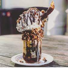 Our 5 Pieyow Is A Better Breakfast Than I Can Make Praline Pecan Ice Cream In A Chocolate Iced Jar Dipped In Pecans Topped With Whipped Cream Fudge Syrup