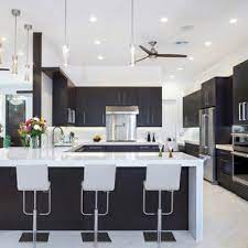 This farmhouse kitchen remodel got a sleek upgrade with black pearl granite countertops and white raised panel cabinets. 75 Beautiful Marble Floor Kitchen With Black Cabinets Pictures Ideas August 2021 Houzz