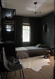 Shades of black, gray, and blue are often found in modern men's bedrooms. Moody Walls Cozy Small Bedrooms Mens Bedroom Decor Aesthetic Bedroom