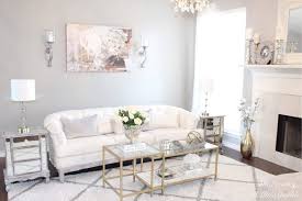 This hack costs close to nothing, but it has a big impact! Living Room Tour Part 1 Oliver Gal Canvas Art Serving Roses Tufted Sofa Ikea Hack Vittsjo Nesting Tables Gold Marble Coffee Table Summer Adams