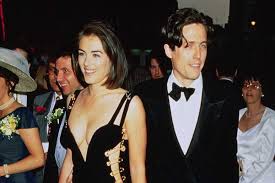 The plunging black and gold. Donatella Versace Shocked At Reaction To Elizabeth Hurley S Safety Pin Dress
