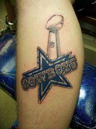 Black ink guns in cowboy skeleton hand tattoo design. Dallas Cowboys Tattoos Ideas Nail Art Tattoo Cowboy Tattoos Dallas Cowboys Tattoo Dallas Cowboys Nail Designs