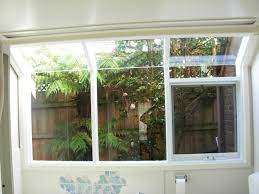 Creating a sunfilled indoor garden bringing the joy of flowers and herbs into your home. Aluminium Bay Windows Garden Hooded Windows Doorand Window Exchange