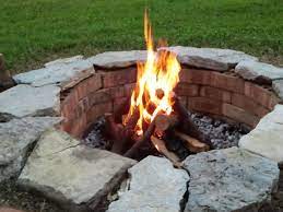 My Homemade Fire Pit Cost 0 00 Simple And Made From Repurposed Brick And Creek Rocks With Some Gravel In Bot Fire Pit With Rocks Fire Pit Brick Fire Pit