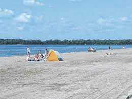 At the beach or swimming area. 8 Beaches Nearby To Cool You Off Fairborn Daily Herald