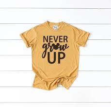 Never Grow Up Disney White Tee Disney Tees Heart For Kids Tees