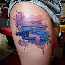 Unlike standard tattoos, watercolor tattooing typically does not begin with a hard, defined outline in black ink, but rather the image is free formed and colored in a somewhat lighter shading. Winter Landscape Watercolor Ink Winter Tattoo Tattoos Cool Tattoos