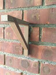 Nice 3d Printing Project Using Wood Filament Brackets To Hang A Shelf On My Brick Wall I Dont Like Drilling Brick Hanger Brick Wall Decor Hanging Window Boxes