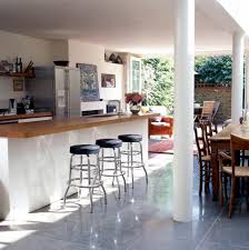 A kitchen open to the dining room, raw and authentic. Open Dining Room With Adjoining Kitchen Interior Design Ideas Ofdesign
