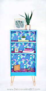 Upcycle A Bookshelf With Peel And Stick Wallpaper Delicious And Diy Bookshelf Makeover Furniture Bookshelves Colorful Furniture
