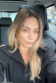 Nadia Bartel shows off her pricey designer Balenciaga bag