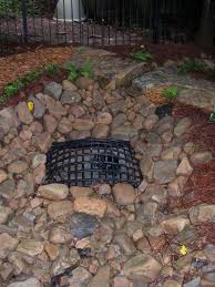 Rain gutter downspout pipe for roof runoff with open water drainage. Solve Common Drainage Problems Hgtv