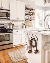 Farmhouse Cottage White Kitchen With Open Shelves And Rustic Antiques And Vintage Decor French Country Kitchens Rustic Kitchen Cabinets Old Farmhouse Kitchen