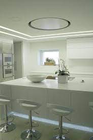 Bassano Del Grappa Cucina Design In Laccato Bianco Lucido E Corian Glacier White Pavimento In Onice Rivestimenti Arredamento Arredamento Moderno Illuminazione