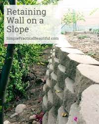 Diy Retaining Wall On A Slope Landscaping On A Hill Building A Retaining Wall Landscaping Retaining Walls
