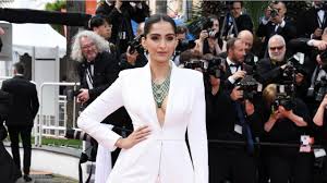 Walk with us through sonam's . We Re Still Swooning Over Sonam Kapoor S White Tuxedo Dress From Cannes Harper S Bazaar Arabia