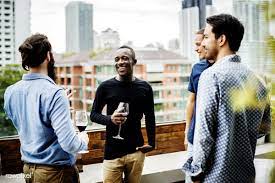 Download Premium Image Of Group Of Male Friends Chilling On The Rooftop Rooftop Rooftop Photoshoot Friends Hanging Out