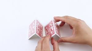 Start of by holding your first card and then lean another card by the middle on your first one, then repeat until your cornerstone is made. How To Build A Tower Of Cards 7 Steps With Pictures Wikihow