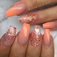 Obsessed With This Muted Orange Ombre This Romantic Coral Shade From Kiaraskynails Is All You Ne Coral Nails Glitter Glitter Nails Acrylic Orange Ombre Nails