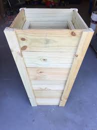 The concrete should fill about ½ to ¾ of the barrel to provide enough stability for the posts. How To Build Your Own Tall Outdoor Planter Boxes Bower Power