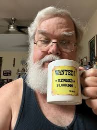 Morning Gang. I found an old coffee mug, I'm guessing this is from @85 when  I took a road trip back home to Iowa. Yeah I know, it's time for a haircut,