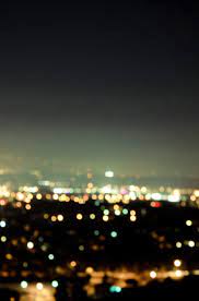 Nighttime reflections of chicago's skyline in lake michigan speak of a city on the move, while the eiffel tower calls to lovers strolling along the seine river in paris. The Glow Of City Lights And Night Skies Love It Landscape Photography Urban Landscape City Lights At Night