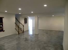 A stained concrete basement floor can be finished without costly contractors and are easy to maintain once sealed. Here Is Another Basement Floor With Stained Concrete Is A Diffrent Color But Conceptually It Ma Basement Colors Stained Cement Floors Painted Cement Floors