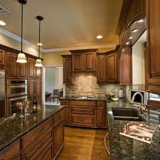 Uba tuba granite with light hioney oak cabinets. 16 Cabinets With Uba Tuba Granite Ideas Uba Tuba Granite Kitchen Remodel Kitchen Redo